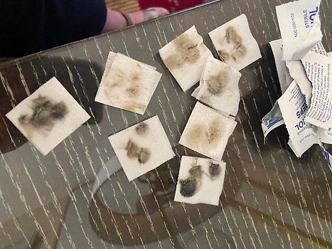 This is only some of the dirt on the bedside table charger. 